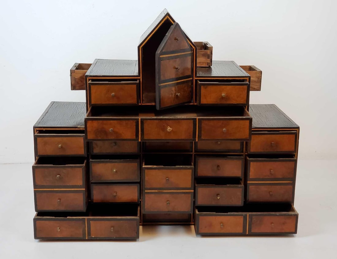 EXCEPTIONAL ANTIQUE INLAID SPICE CABINET APOTHECARY: Late 18th Century English apothecary or spice cabinet / chest featuring drawers in three sides, finished on all four sides, with side handles. With Indian and Arabic design influences. Dimensions: 26&