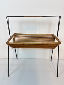 RARE VINTAGE RATTAN MAGAZINE RACK IN THE STYLE OF JOHN RISLEY