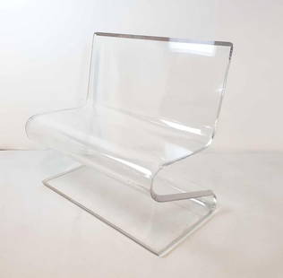 EXCEPTIONAL MODERN CUSTOM LUCITE BENCH ATTRIBUTED TO CAROL PRISANT(1 of 2): A bench of bent 1" thick acrylic with beveled edges. Dimensions: 34.25"h x 38"w x 20"d x 1" thick Artist/Maker: Unknown Provenance: A New York Collector Notes: Alth