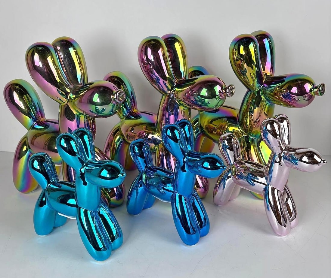 KOONS STYLE IRIDESCENT METALLIC FINISH BALLOON DOG LOT (6 PIECES).: Ceramic Balloons in the style of the artist Jeff Koons Dimensions Larger: 11.5" x 4" x 11" Maker: Unknown Provenance: A New york Collector Notes: Although care is taken to photograph an