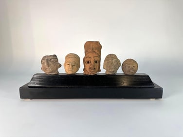 PRE-COLUMBIAN TERRACOTTA HEADS ON CUSTOM DISPLAY STAND