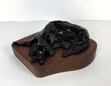 A VINTAGE CAST IRON IRISH SETTER SCULPTURE