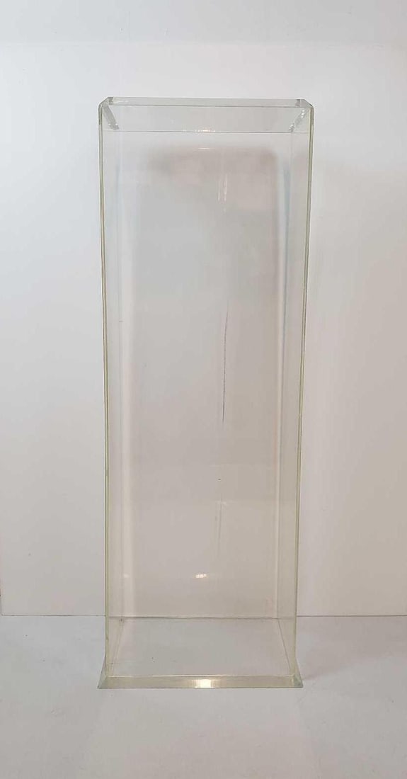 VINTAGE LUCITE PEDESTAL WITH BEVELED EDGE: A vintage Mid-Century Modern lucite pedestal with a beveled edge. Dimensions: 41.25"h x 15" w x 11"d Artist or Maker: Unknown Provenance: From a NYC Collector. Notes: Although care is taken