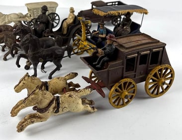 LOT OF ANTIQUE CAST IRON TOYS INCL HORSE DRAWN CARRIAGES