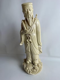 CHINESE BLANC DE CHINE STANDING FIGURE WITH SWORD