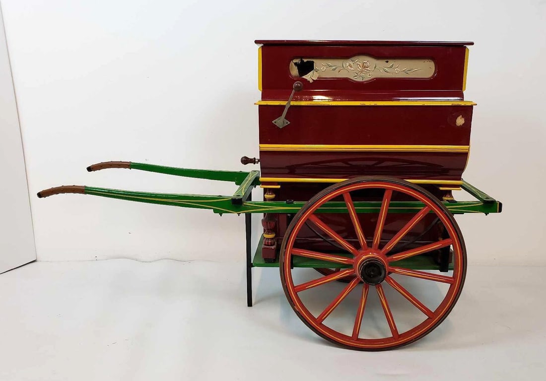VINCENTE LLINARES FAVENTIA BARREL ORGAN HURDY GURDY TWO ROLL CART: A vintage, hand-cranked Spanish musical instrument, also known as a street piano or organ grinder, which is mounted on a two-wheeled cart and plays pre-programmed tunes from an internal barrel. Dimen