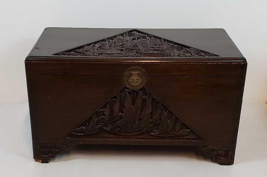 CHINESE J.L. GEORGE CARVED CAMPHOR WOOD CHEST: A vintage Chinese carved camphor wood chest. Dimensions: 19.5"h x 35.5"w x 19.5"d Artist or Maker: J.L. George Prop., Shanghai Provenance: From a NYC Collector. Notes: Although care is take