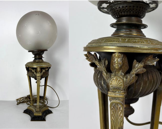 ANTIQUE EGYPTIAN REVIVAL LAMP: A brass table lamp with sphinx details. Dimensions: 18.5" X 7" Maker: Unknown Provenance: A New York Collector Appeal: French, antique lamp, vintage table lamp, brass lamp, bronze lamp, Eg