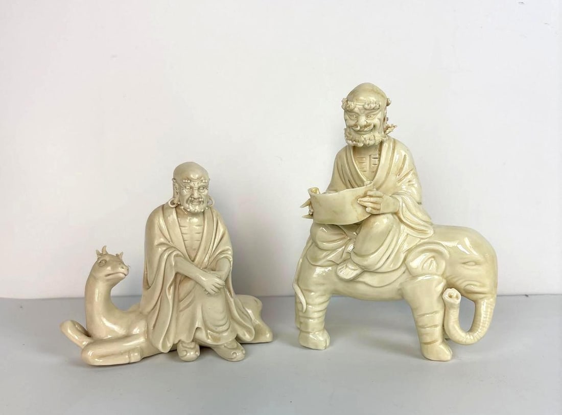 PAIR OF VINTAGE BLANC DE CHINE LOUHAN / ARHAT PORCELAIN FIGURES ON ANIMALS (1 of 8)