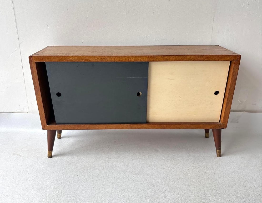 FRENCH MC CAB WITH SLIDING DOORS: Vintage mid-century modern walnut credenza with sliding doors Dimensions: 20" tall x 34" x 12" Artist or Maker: Unknown Notes: Although care is taken to photograph and describe the item