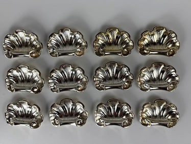 12 CHRISTOFLE SILVER PLATED  'COQUILLE" SHELL FORM  KNIFE / CHOPSTICK REST