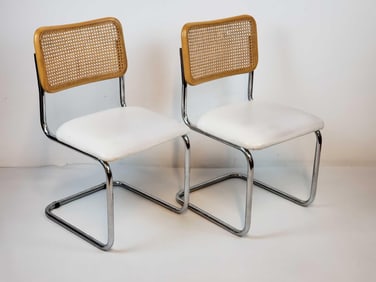 PAIR OF CESCA-STYLE CANED BACK VINYL UPHOLSTERED SIDE CHAIRS