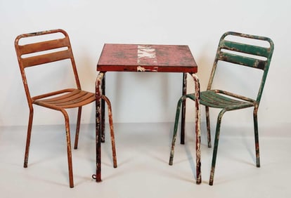 VINTAGE FRENCH DISTRESSED METAL CAFE TABLE ATTRIBUTED TO JEAN PROUVE AND PAIR OF METAL CHAIRS