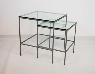 TWO GLASS TOP METAL NESTING TABLES