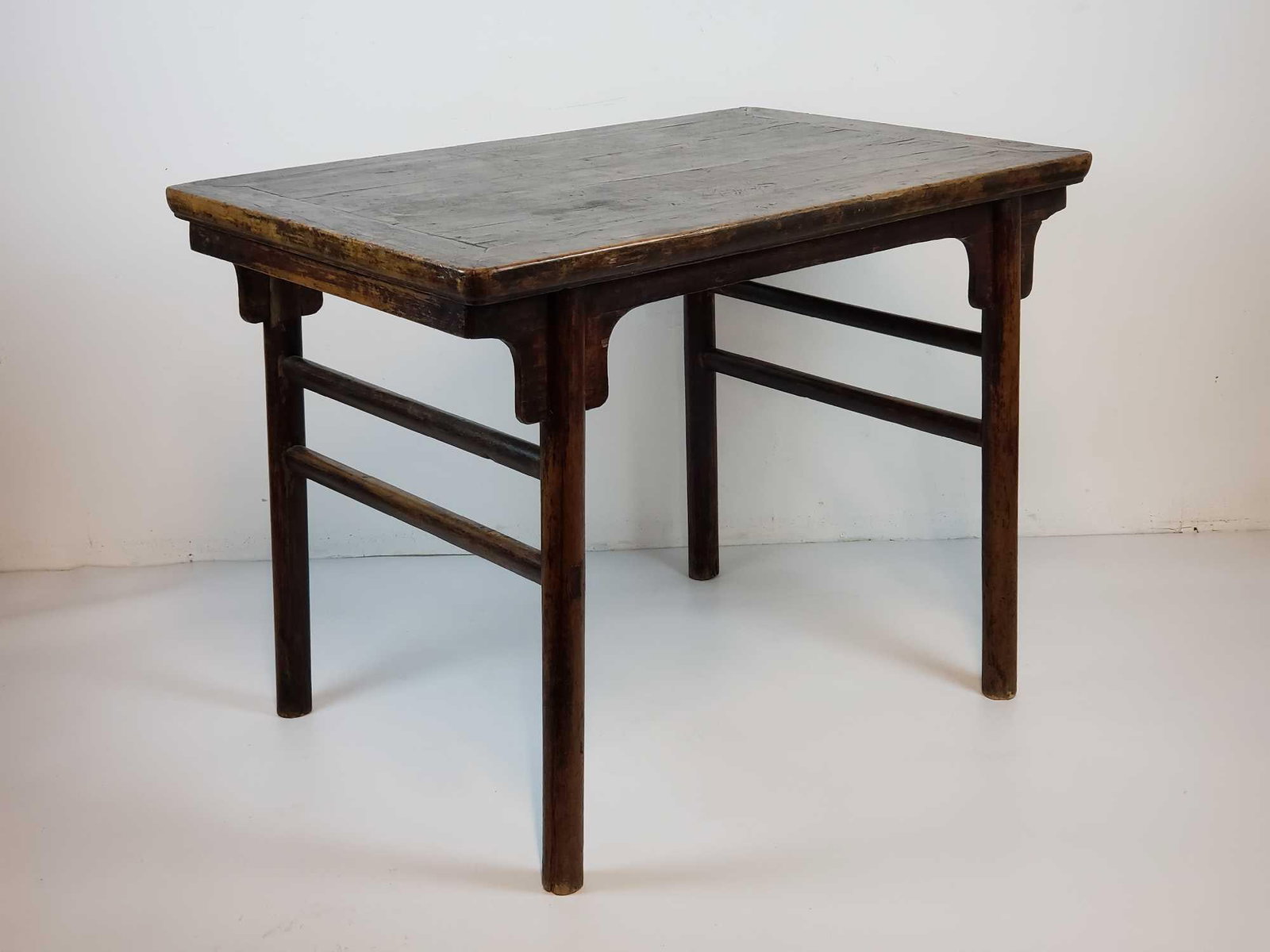 19th CENTURY CHINESE ELMWOOD WINE TABLE: An exceptional antique Chinese table. Dimensions: 32"h x 43"w x 28.5"d Maker: unknown Provenance: A New York Collector Notes: Although care is taken to photograph and describe the item, ab