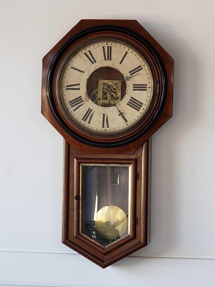 ANSONIA CLOCK CO. EARLY 20TH CENTURY SCHOOL HOUSE CLOCK WITH VISIBLE MOVEMENT, PENDULUM, KEY: *School House Clock Dimensions:32"h x 17"w x 4.5"d Maker: Ansonia Clock Co. Provenance: A New York Collector Notes: Although care is taken to photograph and describe the item, absence o