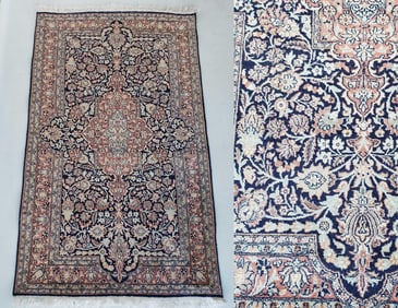 FINE SILK AND WOOL HAND-KNOTTED PERSIAN MEDALLION RUG