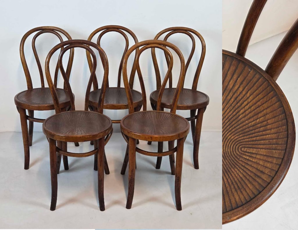 SET OF FIVE THONET BENTWOOD CAFE CHAIRS: A set of five, dark stained wooden chairs featuring a bentwood frame with a double loop backrest, four slightly curved legs, and a round seat with a central radiating swirl pattern in the wood. Dimen