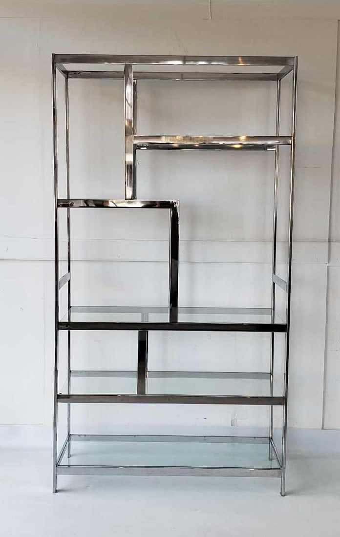 VINTAGE MILO BAUGHMAN STYLE MODERN CHROME ETAGERE WITH GLASS SHELVES: *A modernist shelving unit Dimensions: 76"H x 41"W x 18"D Artist or Maker: Unknown Provenance: From a New York City Collector Notes: Although c