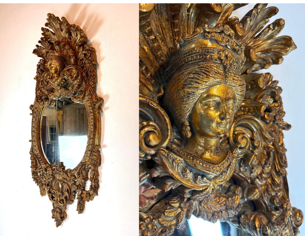 GILT FRAMED MIRROR WITH FEMALE FIGURAL CARTOUCHE BUST 59 INCHES TALL: *Gilt Framed Mirror with Female Bust Dimensions: 59" x 26.5" Maker: Unknown Notes: Although care is taken to photograph and describe the item, absence of a condition report does not imply perfect cond