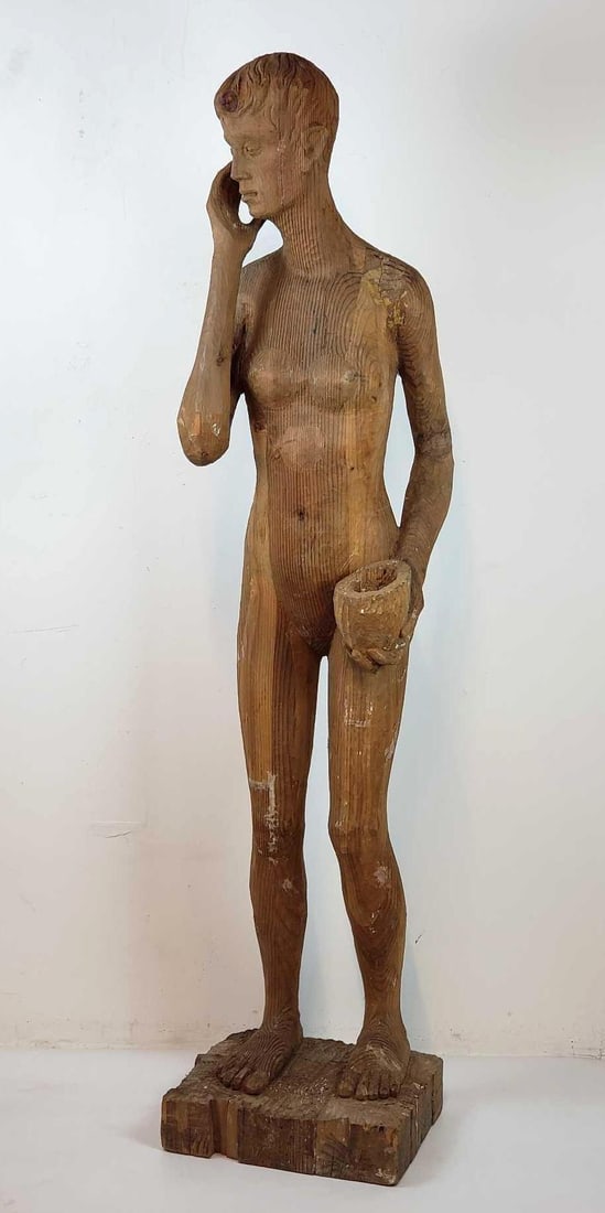 LIFE SIZED CARVED WOOD OUTSIDER ART SCULPTURE | BALKENHOL STYLE: *A sculpture reminiscent of the style of Stephan Balkenhol Dimensions: 72"h x 16.5"w x 14"d Maker: Unknown Provenance: A New York City (Soho) Collector Notes: Although care is