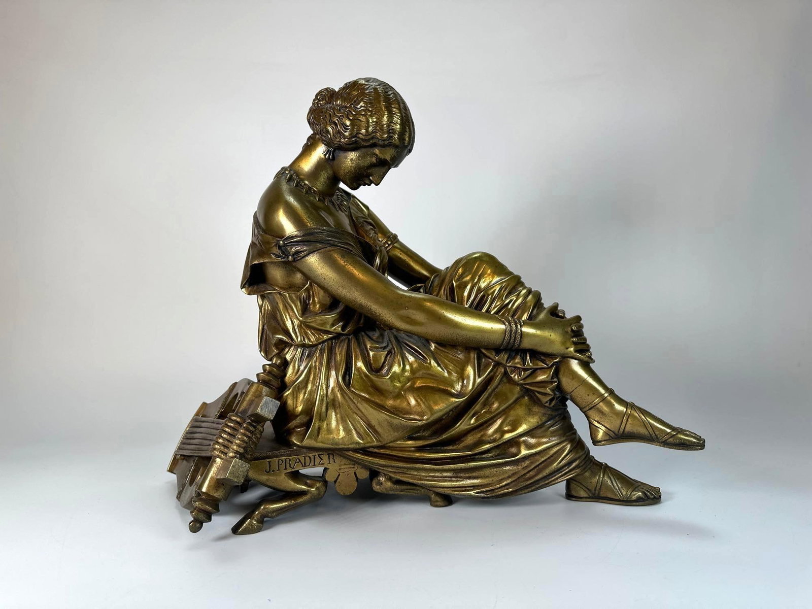 JEAN-JACQUES PRADIER 'THE SEATED SAPPHO' PATINATED BRONZE, SIGNED ANTIQUE: *19th-Century Neoclassicism: Pradier's Bronze "Sappho", late 1800's. Dimensions: 14"H x 18"W x 8"D Artist or Maker: Jean-Jacques Pradier Provenance: A New York Collector