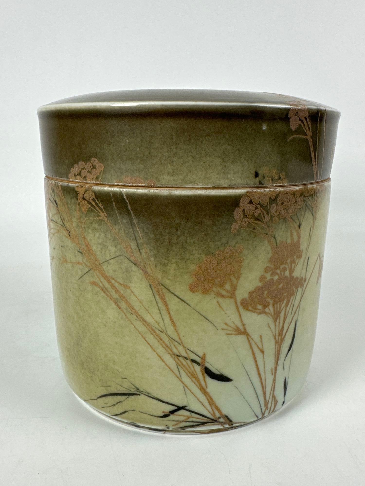 VINTAGE ROYAL COPENHAGEN JAPONESQUE LIDDED JAR WITH GRASS MOTIF: An antique or early vintage lidded cylindrical jar from the Royal Copenhagen Porcelain Manufactory of Denmark. Dimensions: 6”H x 6”W x 6” D Maker: Royal Copenhagen Provenance: The