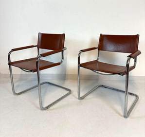 PAIR OF LOEWENSTEIN OGGO CHROME & FAUX LEATHER ARM CHAIRS