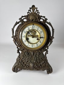 ANTIQUE ORNATE MANTLE CLOCK: OPEN ESCAPEMENT, PORCELAIN DIAL, CAST METAL CASE