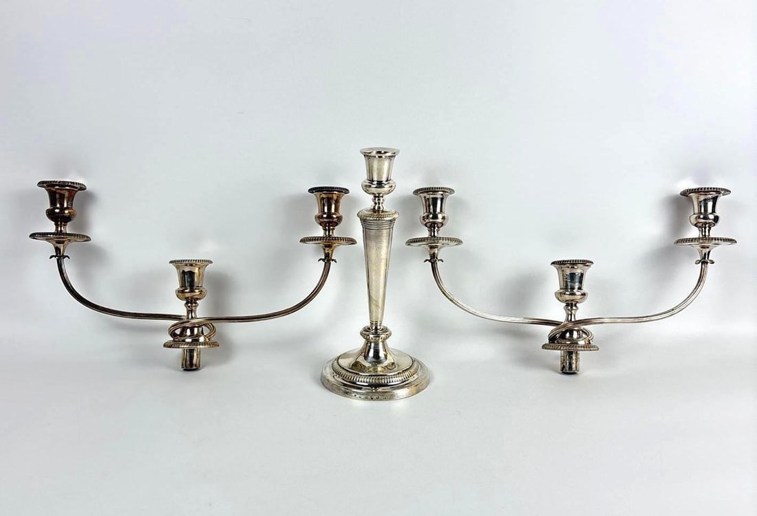 WEIGHTED STERLING SILVER CANDELABRA COMPONENTS: A candlestick and two matching candelabra arms Candlestick Dimensions: 12"H Candelabra Dimensions: 17.5"W Weight of Two Candleabra Arms: 70 ozt Weight of Single Weighted Base: 29 ozt Artist/Maker: U