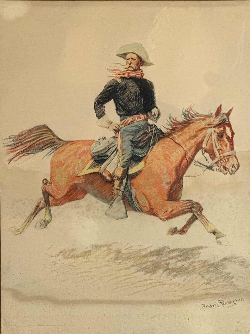 FREDERIC REMINGTON "A CAVALRY OFFICER" FROM A BUNCH OF BUCKSKINS (1901) CHROMOLITHOGRAPH: Original 1901 color lithograph published by R.H. Russell depicting a United States military officer on horseback Approximate Dimensions: 20" x 15" ; Frame 25.75"H x 19.75" Artist or