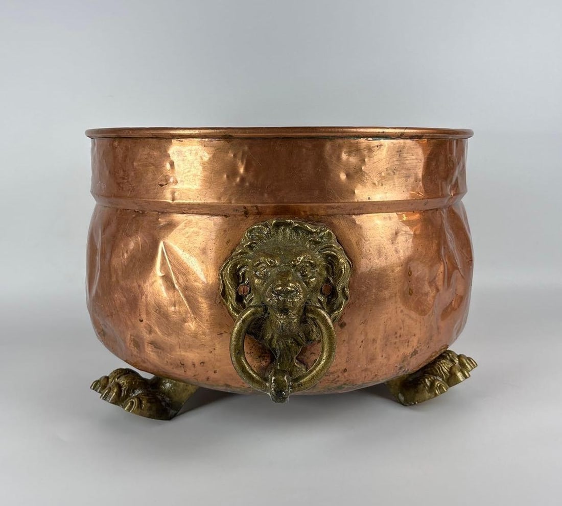 LARGE ANTIQUE COPPER & BRASS LION HEAD BOWL CHILLER | CHAMPAGNE BUCKET: Large 20-inch diameter hand-hammered copper basin with twin polished brass lion head ring handles and a flared rim suitable for use as a multi-bottle wine or champagne cooler Approximate Dimensions: