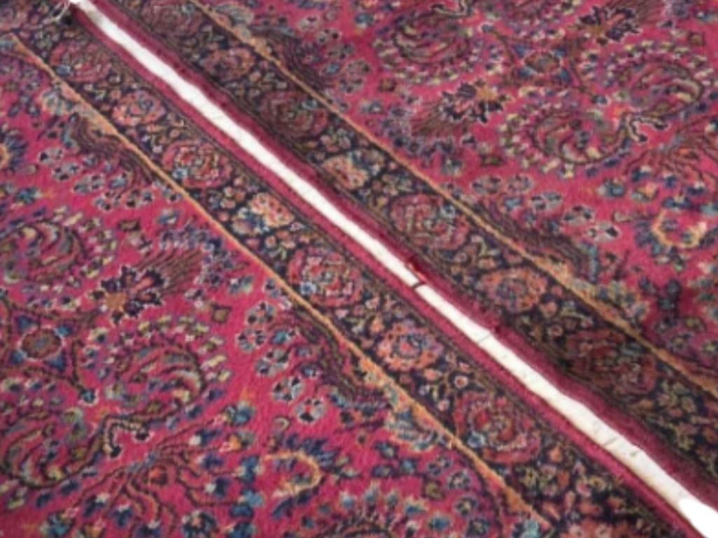 PAIR OF VINTAGE PERSIAN SCATTER RUGS WITH DENSE ALL-OVER DESIGN: *A matched pair of vintage hand-knotted Persian wool scatter rugs with an intricate all-over floral and vine motif on a deep plum ground Dimensions: 4'2" x 2'2" Maker: Unknown Provenance: A New York