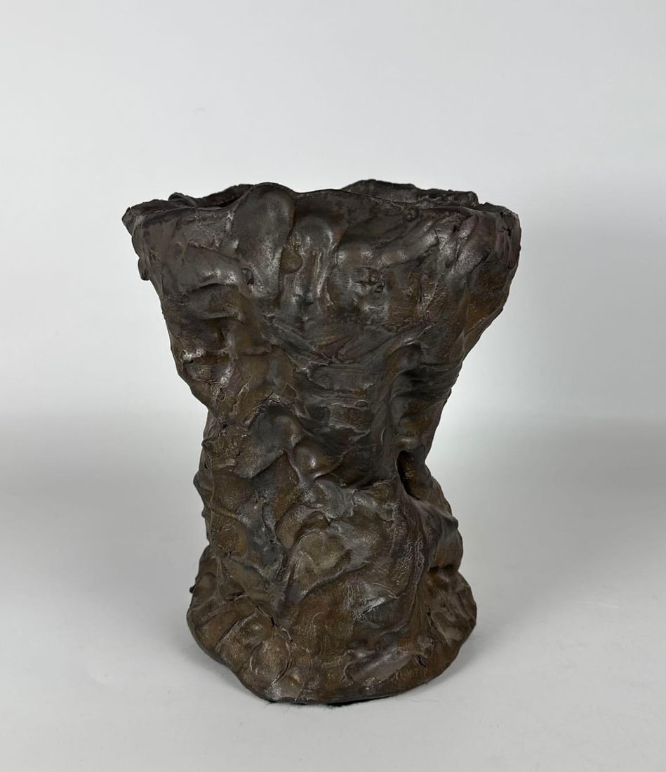 ANDREW LORD CERAMIC HAND-MODELED ABTRACT SCULPTURE DARK MATTE GLAZE: This highly textured, hand-built stoneware sculpture by Andrew Lord is abstract in form, with a deeply irregular surface finished in a dark, earthy, matte glaze. Approximate Dimensions: 10” T x