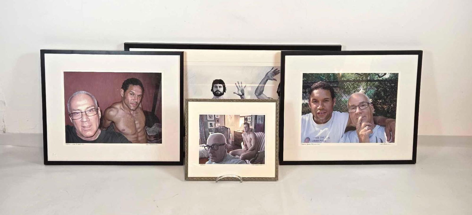 COLLECTION OF FOUR ERIC BELLMANN SELF-PORTAIT WITH MODELS SIGNED WORKS ON PAPER: *A collection of four framed works on paper, featuring male figures in different poses and groupings, each signed and titled. Largest Approximate Dimensions: 24.5"L x 45"W Artist: Eric Bellmann Pro
