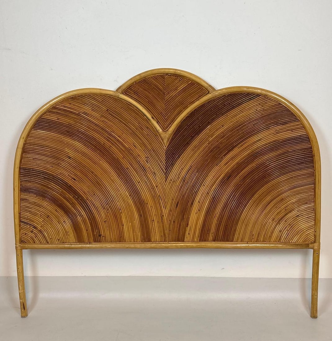 VINTAGE HOLLYWOOD REGENCY PENCIL REED RATTAN HEADBOARD IN THE STYLE OF GABRIELLA CRESPI: *A mid-century modern or vintage headboard constructed from thin, tightly bound rattan reeds, evoking the tropical and glamorous style of designer Gabriella Crespi. Approximate Dimensions: 44.5&rdquo