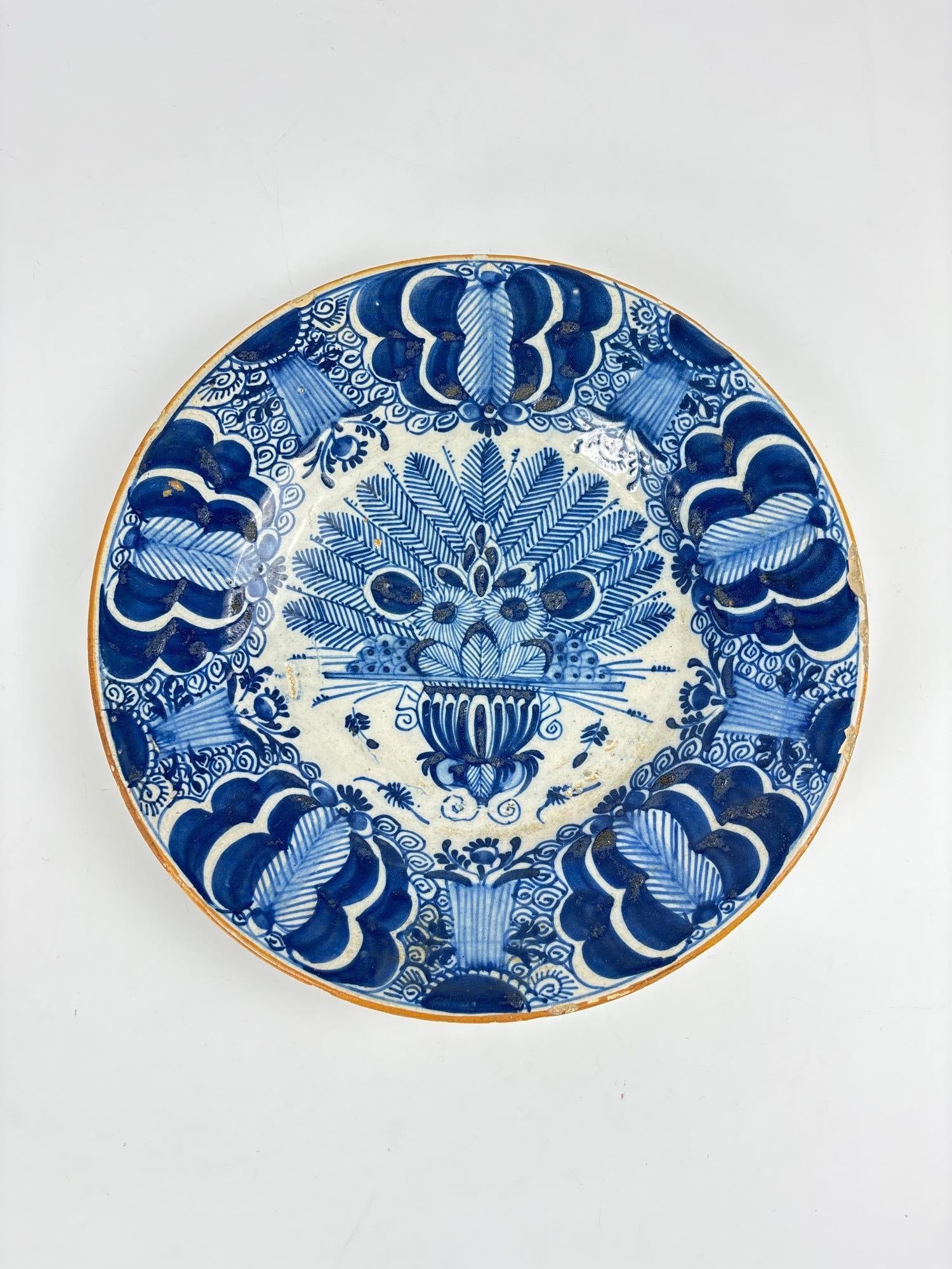 18TH CENTURY DUTCH DELFTWARE 'PEACOCK FEATHER' PLATE: Hand-painted tin-glazed earthenware plates in blue and white 'Peacock Feather' pattern. Approximate Dimensions: 9.5" dia Artist or Maker: Unknown Provenance: From a New York Collector Not