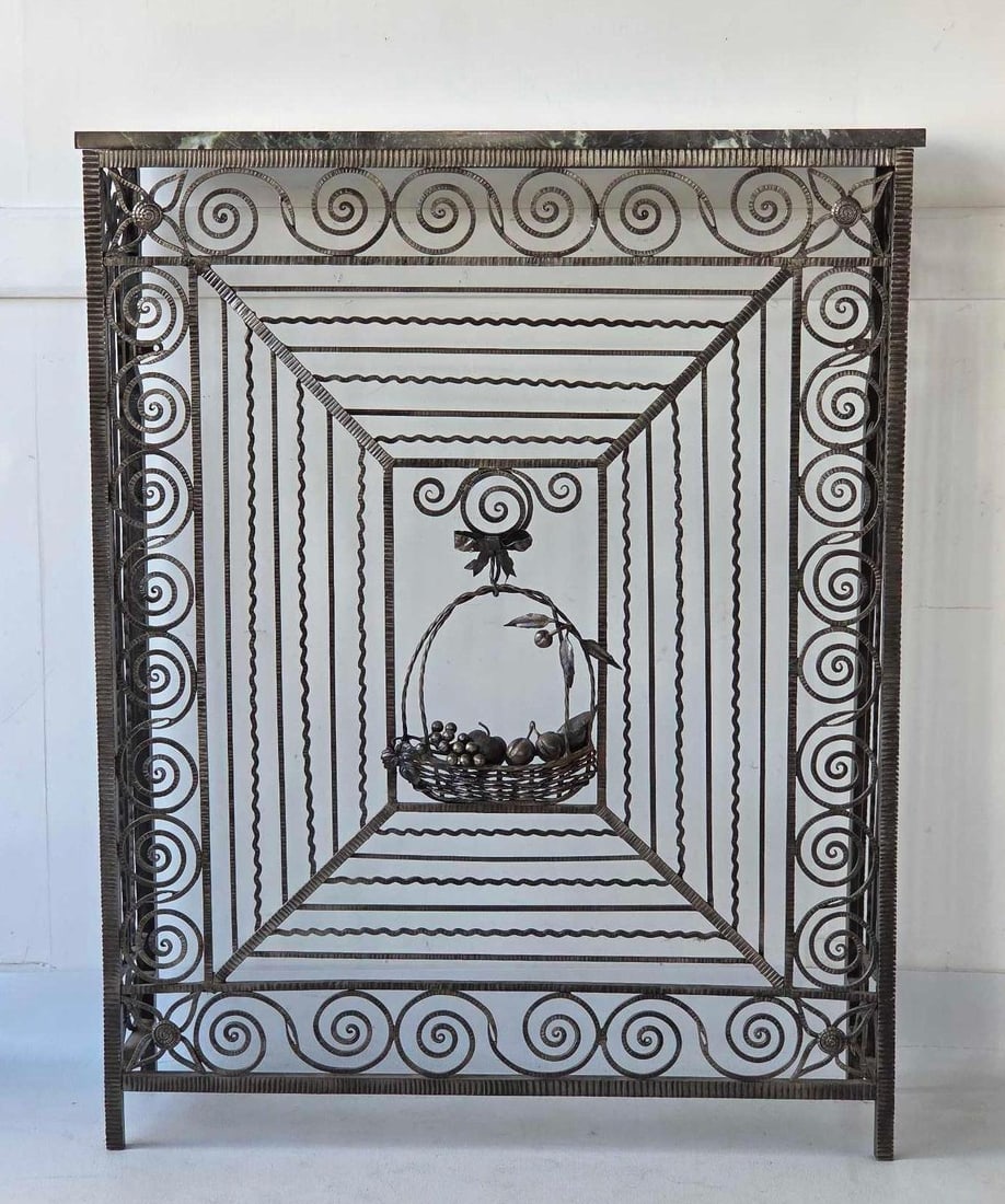 A FINE ART DECO HAND HAMMERED AND SCROLLED WROUGHT IRON MARBLE TOP CONSOLE: *This is an Art Deco-style console table featuring a square, framed form of finely hand-hammered and scrolled wrought iron, incorporating a central basket of fruit motif, and topped with a marble slab