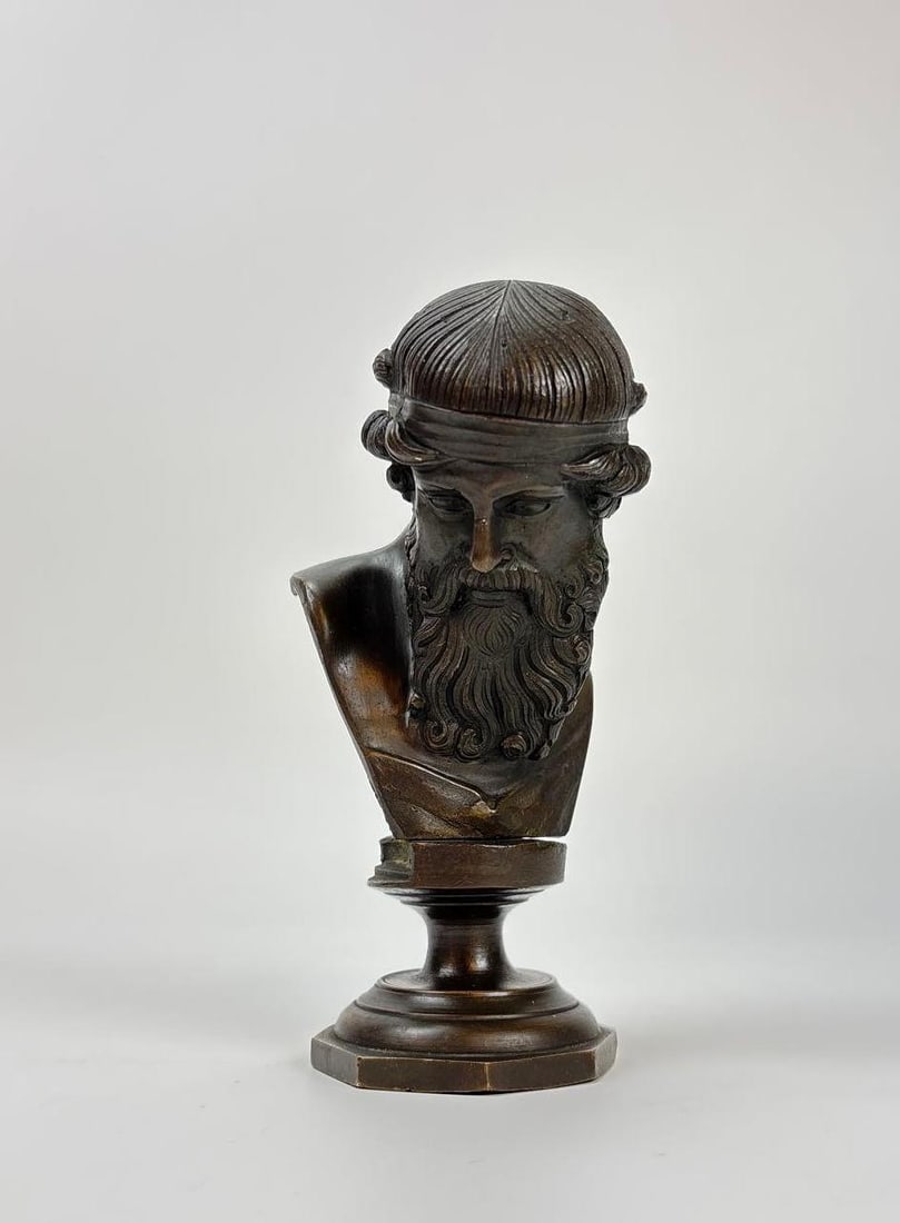 ANTIQUE GRAND TOUR BRONZE BUST OF PLATO DIONYSUS: Patinated exquisitely executed bronze bust modeled after greek god dionysus Approximate Dimensions: 5.5" x 3" Artist or Maker: Unknown Provenance: From a New York Collector Notes: Although c