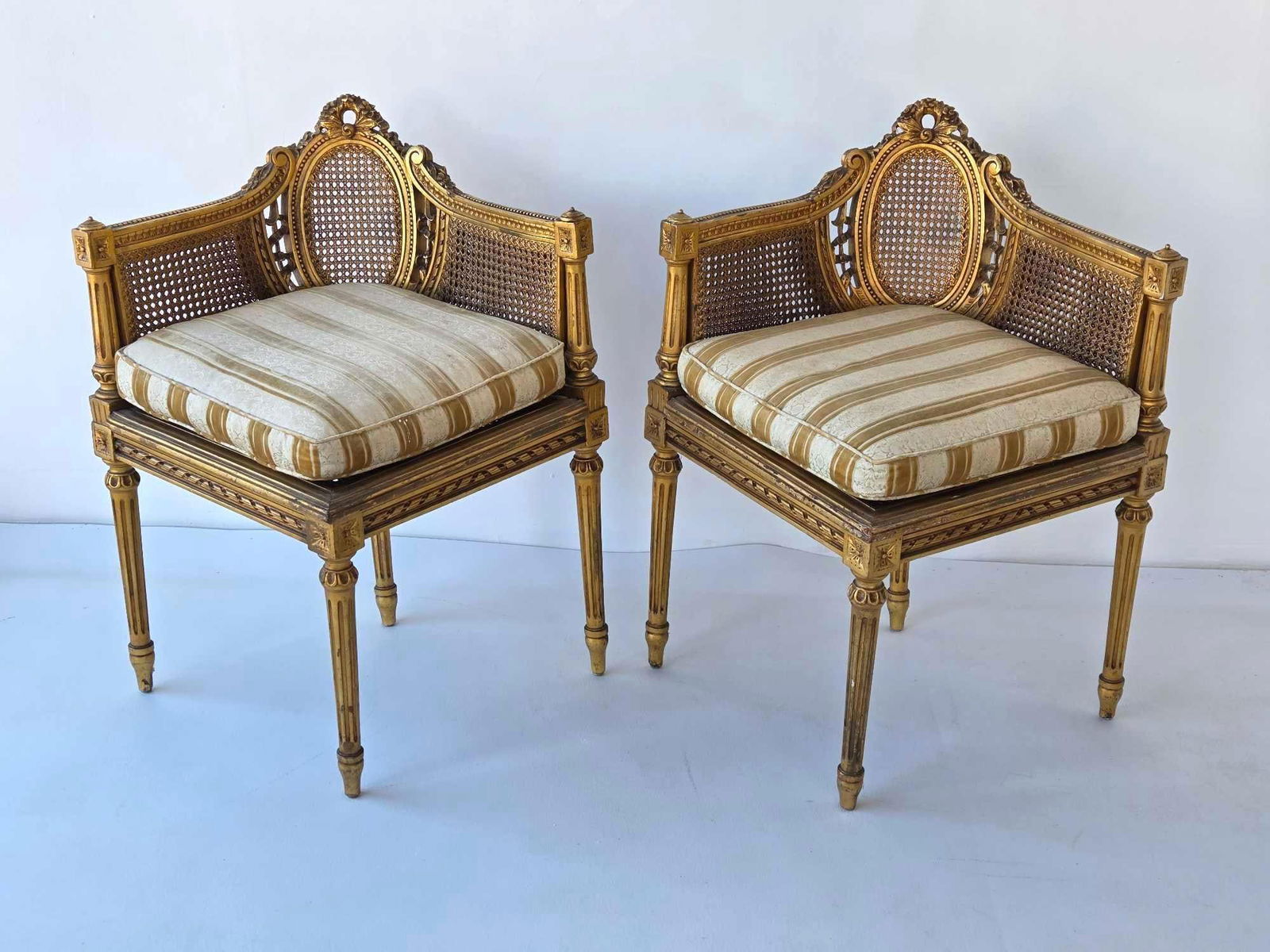 PAIR OF LOUIS XVI STYLE GILTWOOD CANED CORNER CHAIRS (1 of 20)