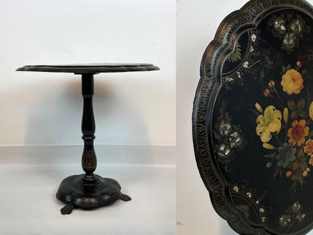 VICTORIAN PAPIER MACHE TILT TOP TABLE: *Antique 19th-century black ebonized papier-mache tripod table with a scalloped-edge tilt top, hand-painted floral center. Approximate Dimensions: 27"H x 28"W x 23.5"D Artist or Maker: U
