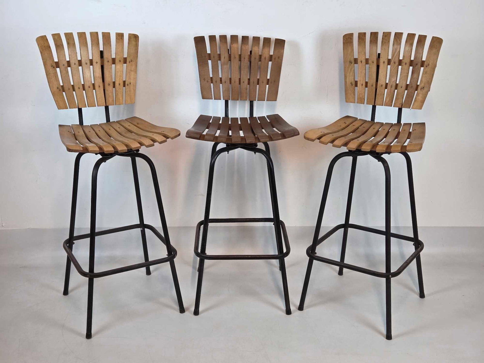 SET OF THREE WOOD SLAT AND METAL BAR STOOLS IN THE MANNER OF ARTHUR UMANOFF (1 of 16)