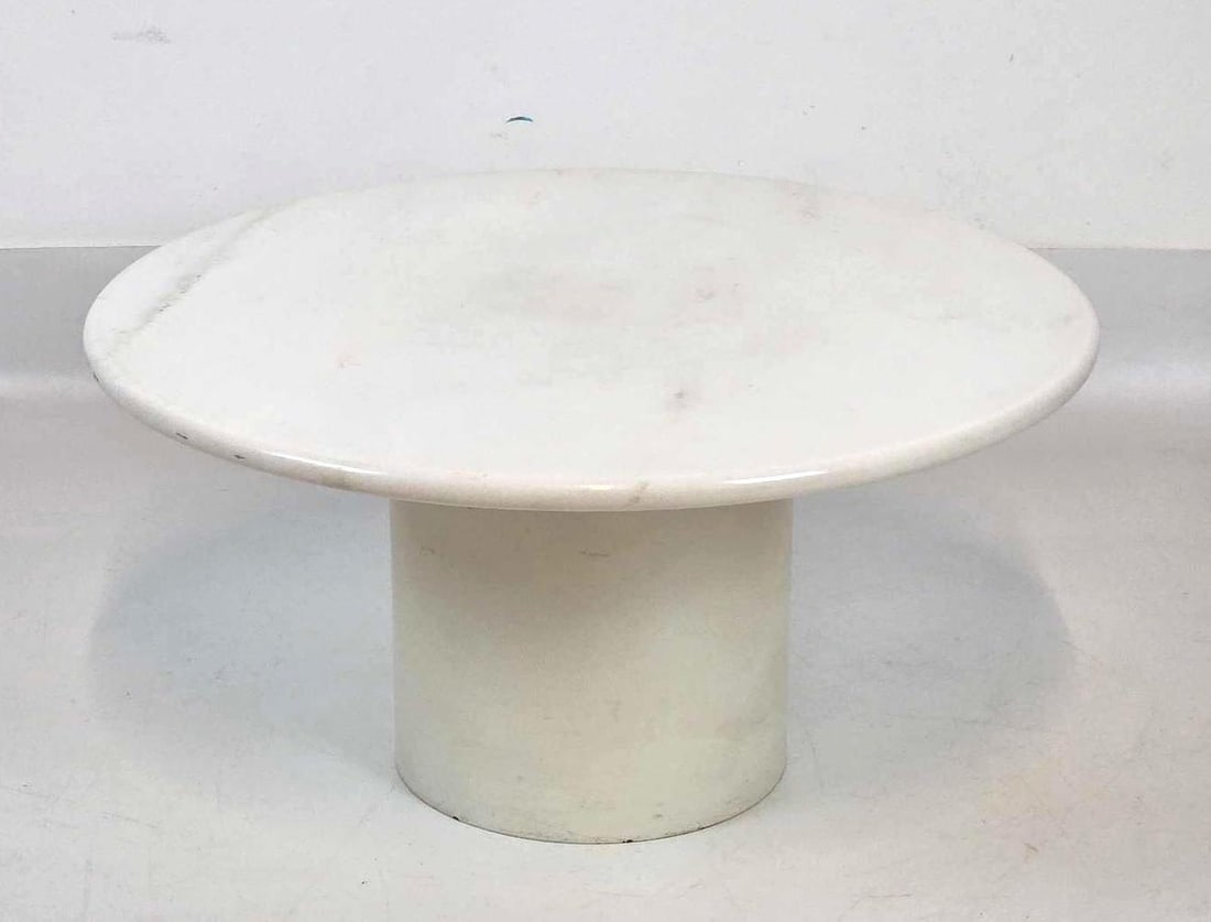 STENDIG ITALIAN STEEL AND MARBLE COFFEE TABLE: White circular marble top on cylindrical plinth base Approximate Dimensions: 12"h x 23.5"dia Artist or Maker: Stendig Provenance: From a New York Collector Notes: Although care is