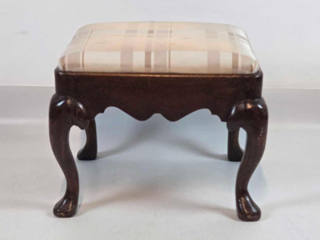 ANTIQUE OAK GEORGIAN FOOT STOOL: Upholstered vanity stool with carved apron and drop-in cushion seat Approximate Dimensions: 15.5"h x 19.5"w x 17"d Artist or Maker: Unknown Provenance: From a New York Collector Notes: Al