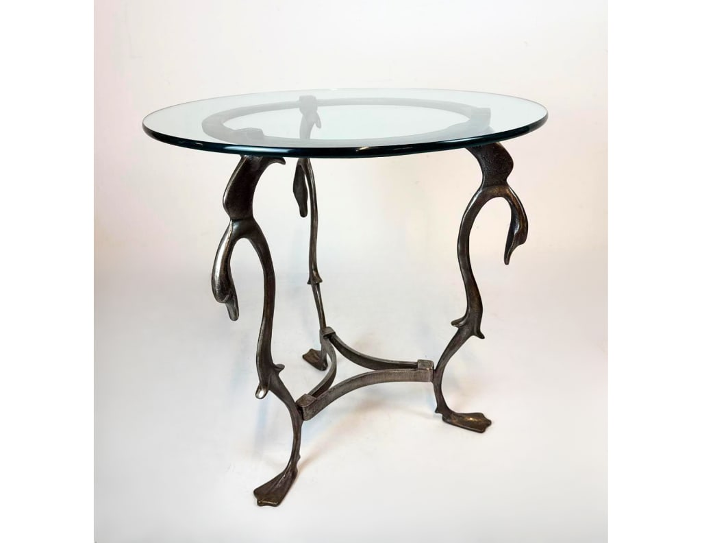 EXCEPTIONAL FRENCH ART DECO STYLE SCULPTURAL SWAN SIDE TABLE W/ GLASS TOP: Vintage cast iron table with swan feet and neck details. Dimensions: 26" dia x 25.5" high Artist or Maker: Unknown Provenance: From a New York City Collector Notes: Although care is taken to p