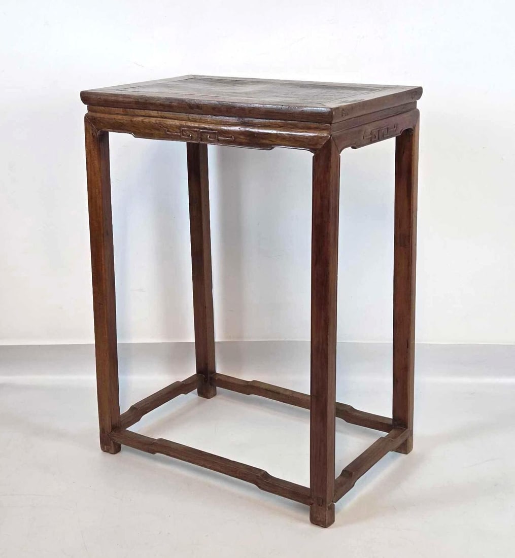 ANTIQUE CHINESE ALTAR TABLE WITH CARVED SKIRT AND HUMPBACK STRETCHER: Chinese hardwood hand-carved scholars stand with floor stretchers Approximate Dimensions: 38.5"h x 27.5"w x 17.5"d Artist or Maker: Unknown Provenance: From a New York Collector Notes: A