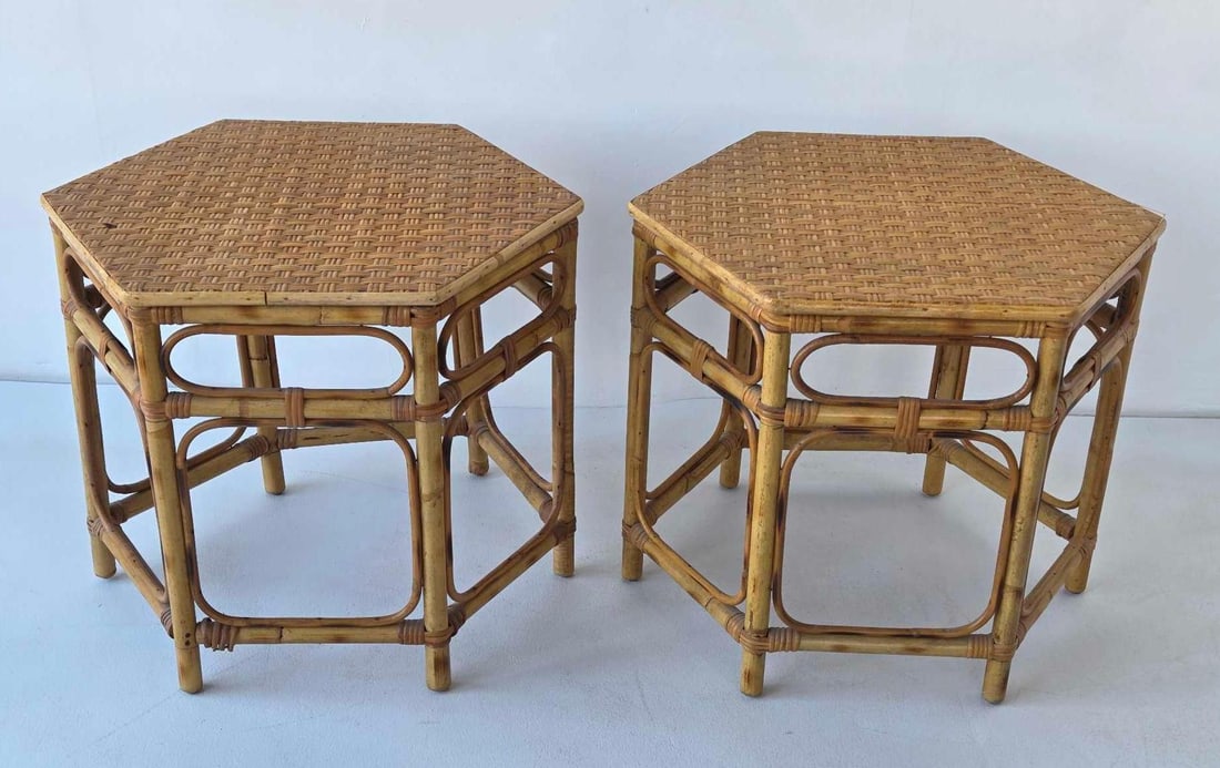 PAIR OF VINTAGE COASTAL MODERN HEXAGONAL PENCIL REED BAMBOO SIDE TABLES: Matching pair of mid-century geometric accent tables featuring vertically arranged pencil reed bamboo and a unique hexagonal silhouette. Approximate Dimensions: 18"h x 22"w x 19"d Artist