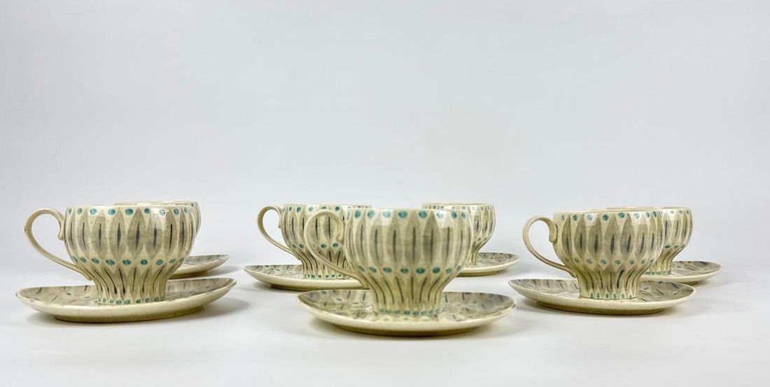 SET OF 6 VINTAGE RED WING "NORTHERN LIGHTS" CUPS & SAUCERS - FUTURA SHAPE: Six mid-century modern ceramic sets in the "Futura" ovoid shape featuring the "Northern Lights" motif of abstract gray leaves and vibrant aqua-blue dots Approximate Dimensions: Cups 3.