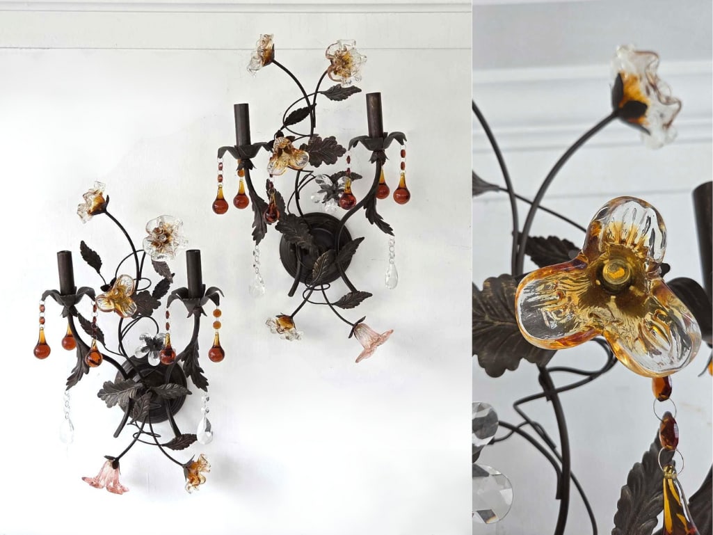 PAIR OF FLORAL MOTIF TWO LITE SCONCES WITH MURANO STYLE FLOWERS AND AMBER DROPS: A pair of two light metal wall sconces with botanical branch frames, hand-blown glass blossoms, and faceted amber and clear crystal pendants. Approximate Dimensions: 23"H x 13"W x 10"D Ar