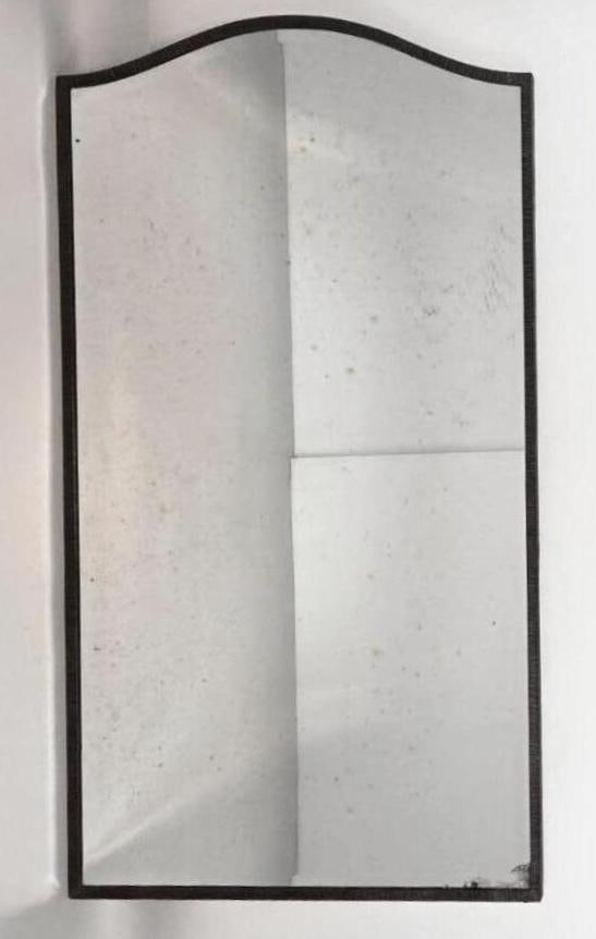 FRENCH WROUGHT IRON FRAMED ARCH TOP BEVELED MIRROR: Large architectural arch top wall mirror with hand-forged scroll work wrought iron frame and heavy beveled glass. Approximate Dimensions: 53"H x 30"W Artist or Maker: Unknown Provenance: Fr